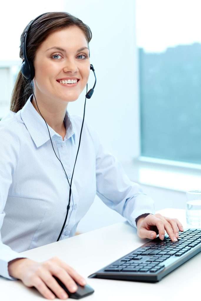 businesswoman-working-online-with-laptop-headset (1)